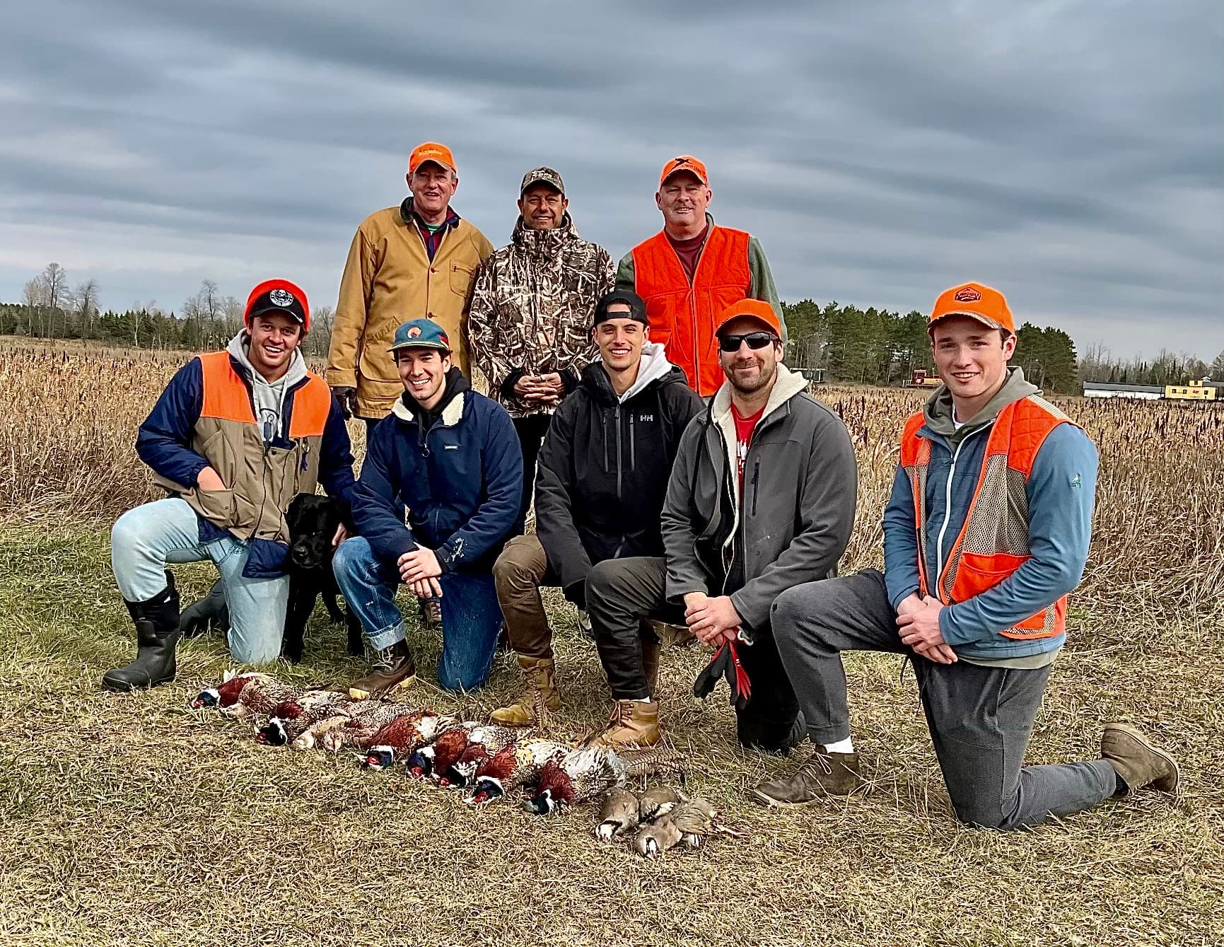 Group of hunters with a day's harvest